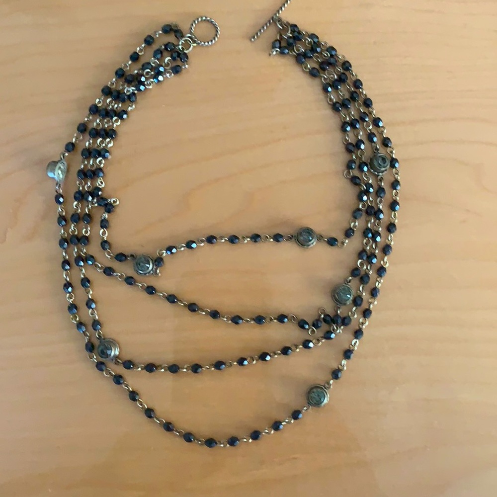 Worn twice. 4 strand black crystal choker with Smoky grey quartz color crystals